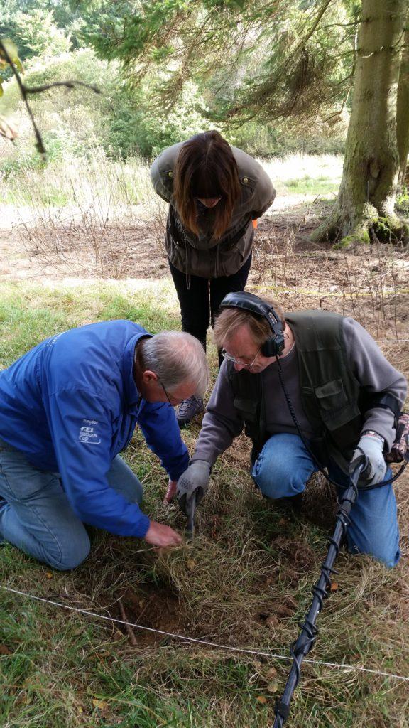 volunteers metal detecting in cemetery Stobs Military Camp Hawick