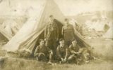 young; soldiers; bell tent; posed photograph